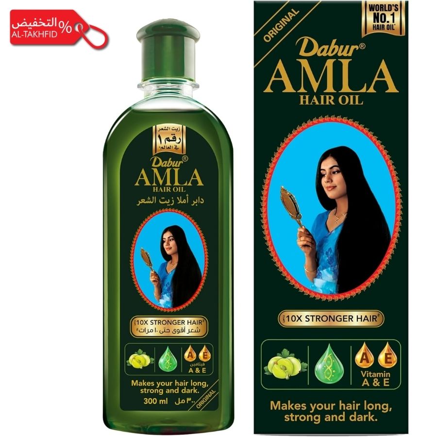 Dabur Amla hair oil bottle and packaging on a white background