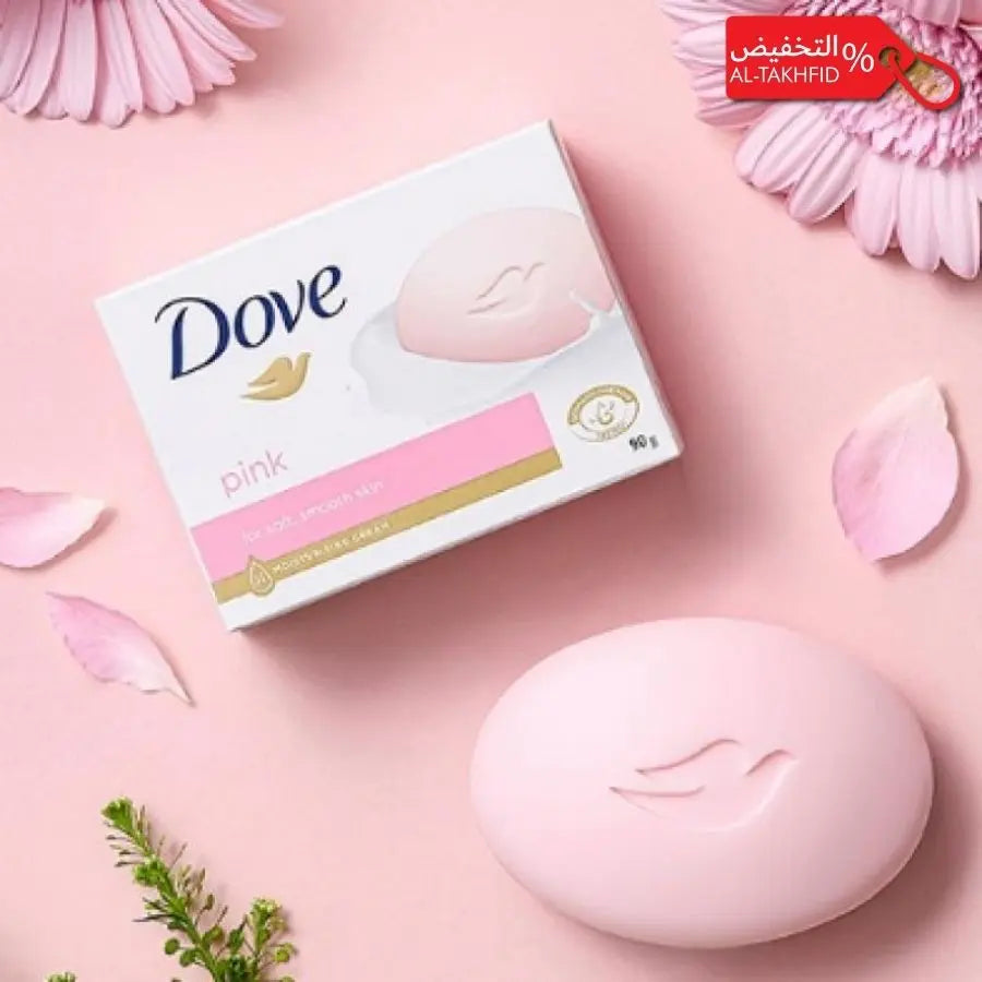 Dove pink soap bar and packaging on a pink background with flowers.