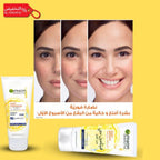 Garnier SkinActive face wash with a woman's face showing before and after effects on a yellow background.
