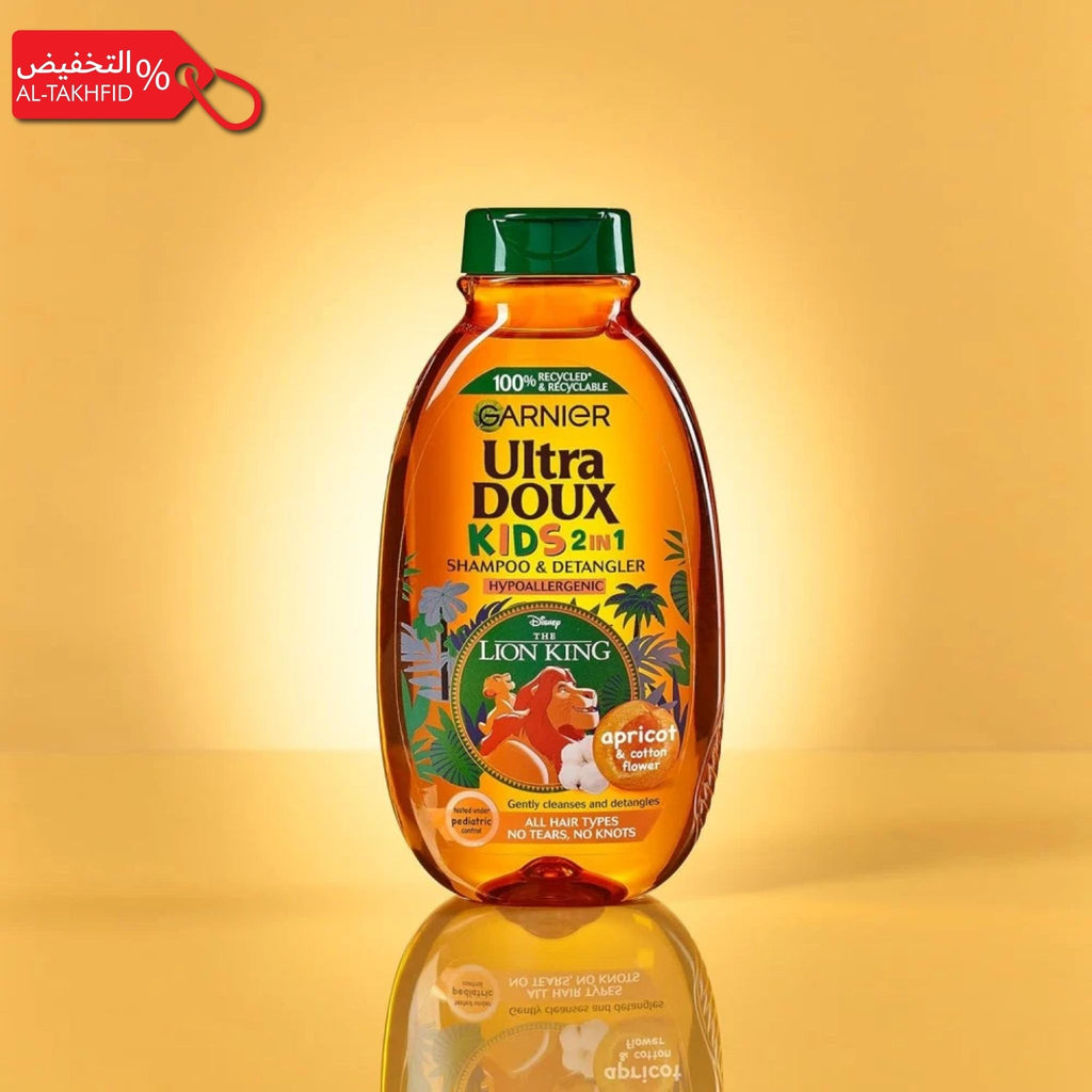 Garnier Ultra Doux Kids 2-in-1 shampoo bottle on a yellow background