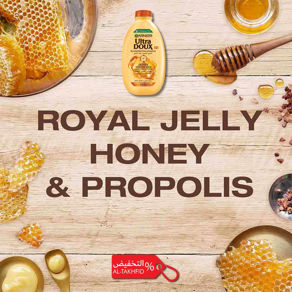 Barnat Ultra Doux shampoo bottle with honeycomb, honey, and propolis on a wooden background.