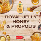 Barnat Ultra Doux shampoo bottle with honeycomb, honey, and propolis on a wooden background.