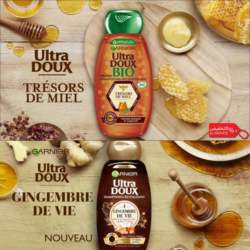 Garnier Ultra Doux hair care products with honey and ginger ingredients on a wooden background