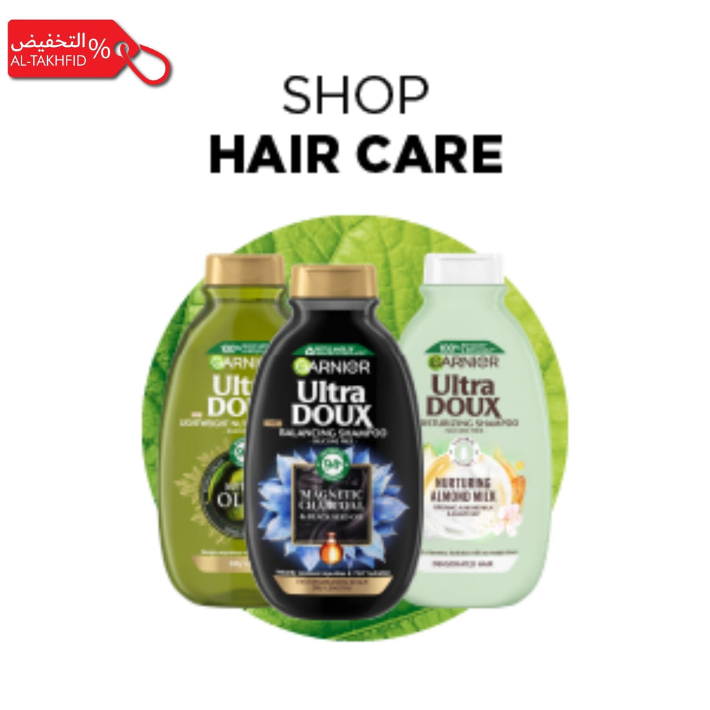 Three Garnier Ultra Doux hair care products on a white background with 'Shop Hair Care' text.