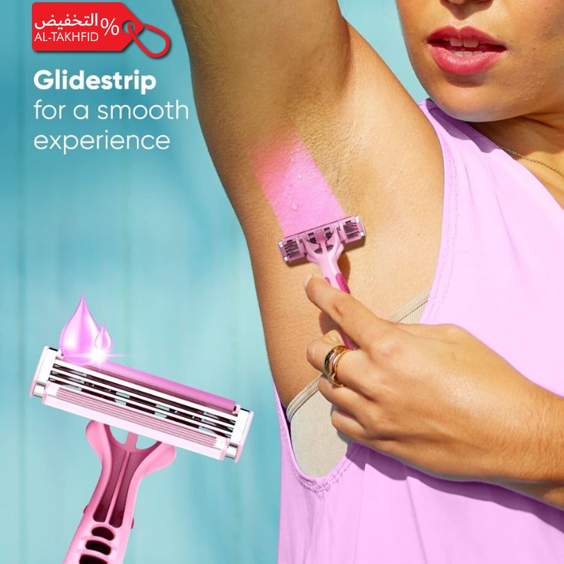 Woman using a pink razor with a glidestrip on a blue background