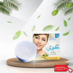 Cosmetic cream with packaging and avocado leaves on a light background