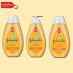 Three bottles of Johnson's baby shampoo on a beige background