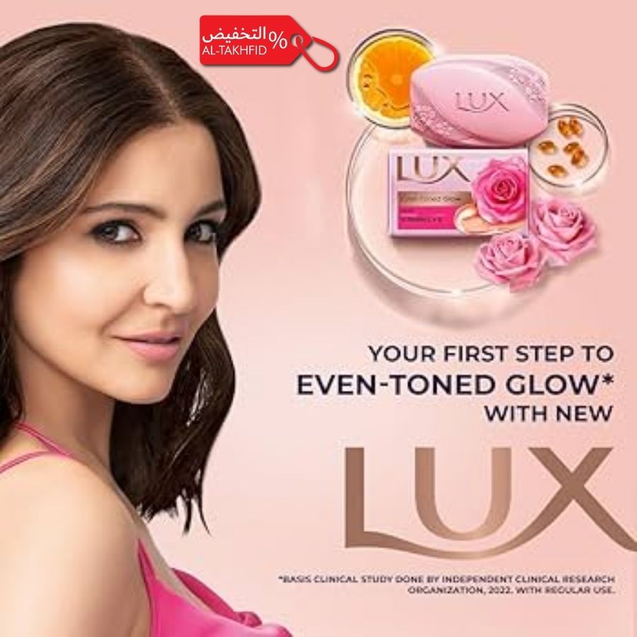 Advertisement for Lux soap with a woman and product display on a pink background