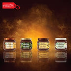 Four jars of UltraDoux hair remedy on a reflective surface with a dark background and promotional text.