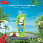 Vatika Volume & Thickness Shampoo bottle with coconut and palm tree background